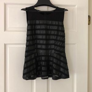 Sleeveless leather and sheer top
